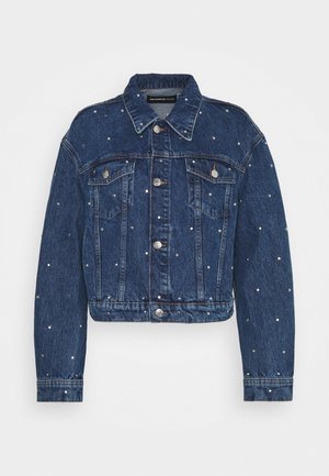 Dark blue denim jacket with silver stud embellishments, button closure, two chest pockets, and long sleeves on a plain background.