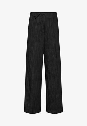 Donkere grijze broek met wijde pijpen, een hoge taille en een asymmetrische klep met knopen aan de tailleband.