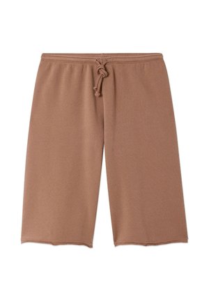 Shorts marron mi-cuisse avec une taille élastique et un nœud à l'avant, fabriqués en tissu doux.
