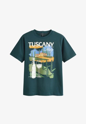 Dark green T-shirt with a Tuscany Italy landscape graphic, featuring cypress trees, a villa, a wine bottle, and a wine glass.