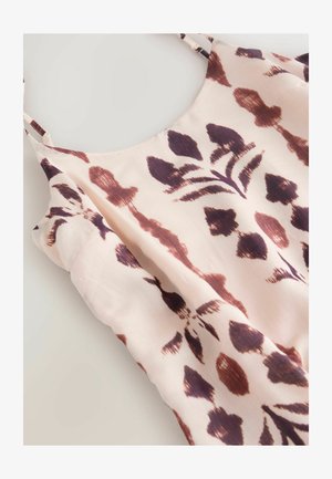 Könnyű anyagból készült felső, bordó és lila virágmintával, puha barack színű háttéren. Vékony vállpántokkal ellátva.