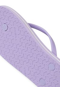 Purple flip-flop with textured sole featuring hexagonal patterns, a white accent stripe, and a flexible strap. Brand "O'Neill" visible.