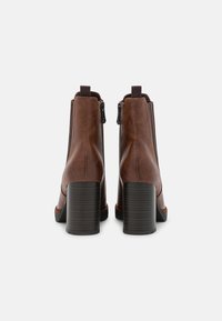 Marco Tozzi Platform ankle boots - chestnut