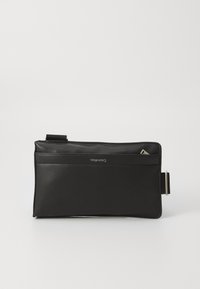 Black leather clutch bag with a smooth texture, features a zip closure, a front pocket, and an adjustable strap. Minimalistic design.