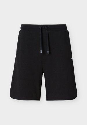 Μαύρα σορτς μέχρι το γόνατο με ελαστική μέση και μαύρα κορδόνια, εμφανίζονται σε απλό ανοιχτό φόντο.