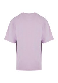 Lilac short-sleeve t-shirt with a round neckline. Made from soft cotton, featuring a simple design and relaxed fit. No visible graphics.
