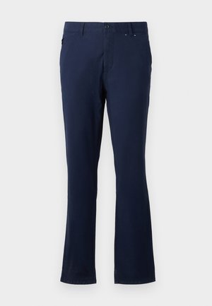 Sötétkék nadrág, könnyű anyagból készült, egyenes szabású, elülső zsebekkel és gombos derékkal.