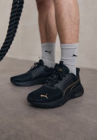 X CELL NOVA UNISEX - Trainingsschoen - black-gold