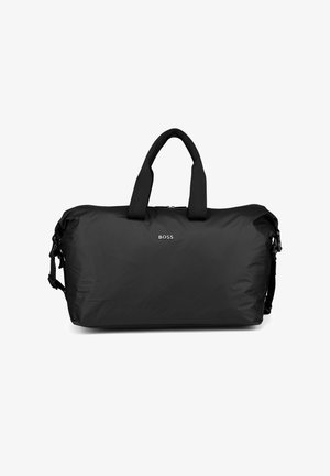 Sac de sport noir en nylon lisse et résistant. Doté de deux poignées solides et d'une bandoulière amovible. Logo affiché à l'avant.