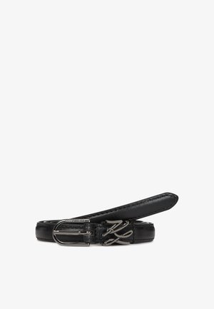 Must mustri vöö, millel on sujuv disain, hõbedatooni pandla ja silmapaistev pressitud muster rihma ääres lisatud detailiks.