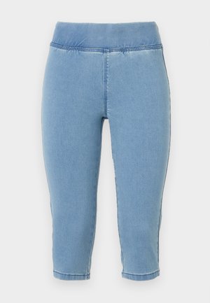 Lyseblå denim capri bukser med elastisk talje, der har en glat overflade og syede sømme, som slutter lige under læggen.