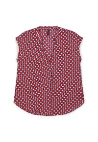 Blusa rossa a maniche corte con scollo a V, caratterizzata da un motivo geometrico di diamanti e cerchi alternati in bianco e nero.