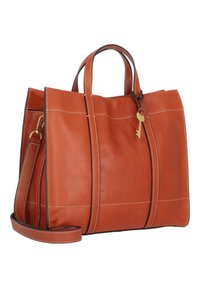 Sac fourre-tout en cuir d'orange brûlé avec des coutures blanches. Il dispose de deux poignées et d'une sangle amovible. Comprend un petit détail en forme de clé.