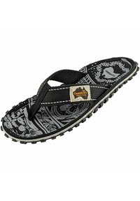 Black flip-flop with graphic floral patterns, textured straps, and a rubber sole with small studs. Features a Gumbies logo tag.