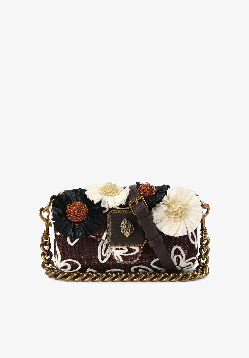 Small dark fabric handbag with white floral embroidery, large black and white fabric flowers with bead centers, a leather strap, and a gold chain.