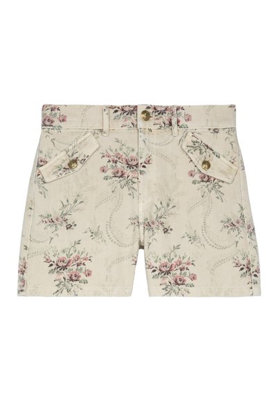 Pantalones cortos con estampado floral hechos de una tela ligera. Fondo crema con flores rosas y verdes, con dos bolsillos delanteros con botones dorados.