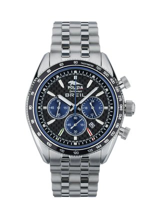 Chronografur med stålnet, dial i sort kulfiber, blå sekundvisere, sølvdetaljer og tachymeter bezel for præcis tidtagning.