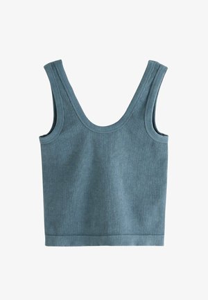Canotta a coste in blu tenue. Presenta una scollatura a giro collo e spalline larghe. Realizzata in tessuto morbido e elastico con superficie testurizzata.