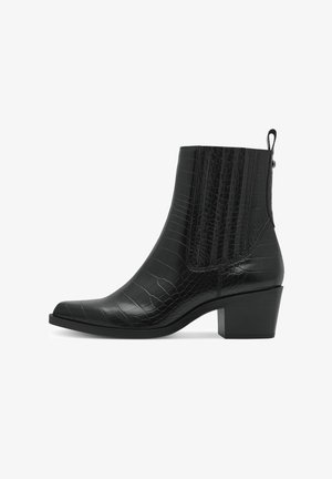 Black ankle boot made of textured crocodile-embossed leather, featuring a pointed toe, elastic side panels, and a low block heel.