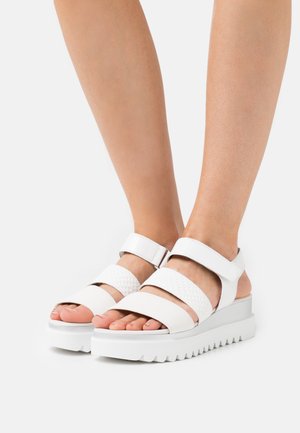 Sandalen met plateauzool - latte/weiß