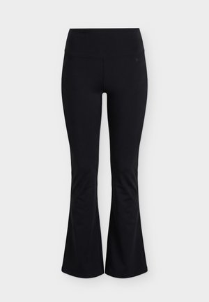 Svarte højttaljede flarebukser med bred taljebånd, tætsiddende over lårene og udvidende under knæene, vist på en ensfarvet baggrund.