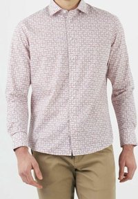 Gestreepte blouse in lichtroze met bloemmotieven. Lange mouwen en een kraag. Het materiaal lijkt licht en glad.