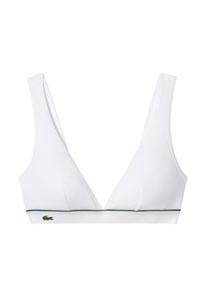 Weißer gerippter Bralette mit V-Ausschnitt, breiten Trägern und einem grünen Akzentband. Hat ein kleines Logo auf dem vorderen Band.