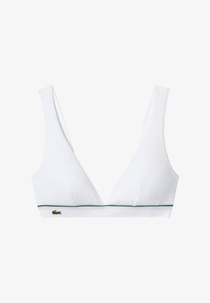 Balta ribuota bralette tipo liemenėlė su V formos iškirpte, plačiomis petnešėlėmis ir žaliu akcentiniu dirželiu. Priekyje yra mažas logotipas.