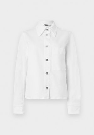 White long-sleeve button-up shirt with collar and chest pocket, featuring six metallic buttons down the front.