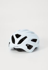 Casque de vélo Kask bleu clair avec un design aérodynamique, présentant des ouvertures de ventilation et une surface lisse, placé sur un fond neutre.