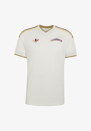 Maillot de sport blanc à col en V avec bordure dorée, rayures multicolores sur les épaules, logo Adidas et texte "VENEZUELA" aux couleurs nationales sur la poitrine.