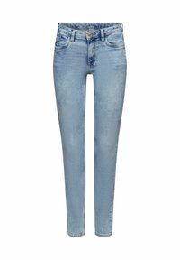 Jean slim bleu clair avec fermeture à bouton et zip à l'avant, poches avant et arrière, et détails subtils délavés.