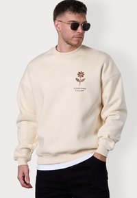 BLOOMING SEASON LOGO OVERSIZED - Sweatshirt - beige