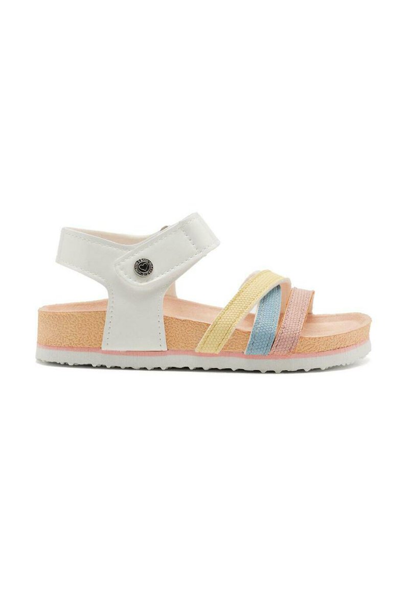 Sandalias blancas con múltiples correas de colores en amarillo, rosa y azul. Suela TEXTURADA y correa ajustable en el tobillo para un ajuste seguro.