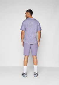 Nike Golf DRI-FIT - Športové šortky - daybreak