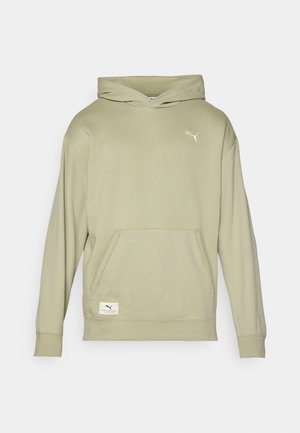 Sweat-shirt à capuche vert avec un devant texturé, poche kangourou et logo brodé. Présente des poignets et un ourlet côtelés.