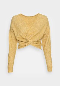 Geel cropped sweater met een gedraaid ontwerp aan de voorkant. Gemaakt van een zachte, textuurstof met lange mouwen en een V-hals.
