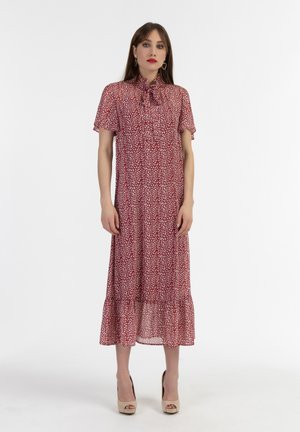 Rode bloemen maxi-jurk met een strik kraag, korte mouwen en uitlopende zoom. Gemaakt van lichtgewicht stof met een transparante textuur en kleine witte patronen.