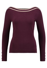 Burgundinen neulottu villapaita pitkähihaisen, leveän kaula-aukon ja kontrastivärisin beigein raitoineen. Ribbed hihansuut sisältävät koristeellisia nappeja.