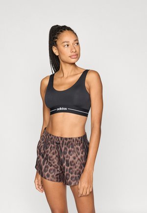 Q1 HYG LS - Sport-bh met medium support - black