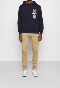 Mennace Jersey con capucha - blue