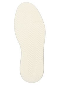 Witte rubberen schoenzool met een gestructureerd zigzagpatroon, cirkelvormige accenten en gladde randen, ontworpen voor grip en comfort.