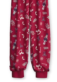 Rote Schlafanzughosen mit festlichem Muster aus Nussknackern, Zuckerstangen, Schneeflocken und Stechpalmen. Elastische Bündchen und weicher Stoff.