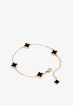 Pulsera en tono dorado que presenta cinco motivos de trébol de cuatro hojas negros, conectados por una delicada cadena, con un cierre de langosta y longitud ajustable.