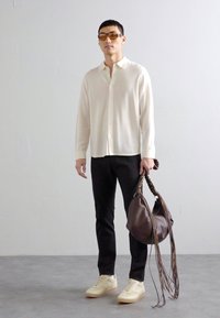 Holzweiler COCOON BIG BAG UNISEX - Torba preko tijela - brown