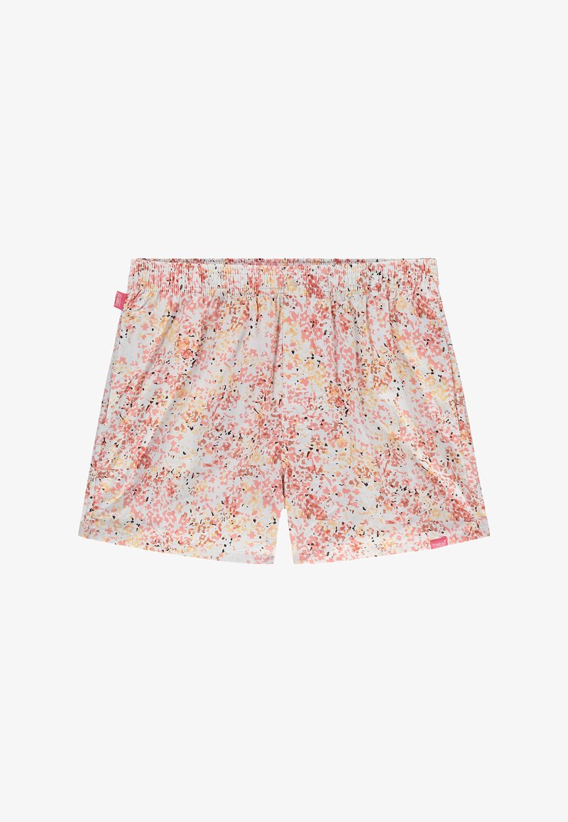 Shorts à taille élastique avec un motif floral abstrait rose, orange et noir sur fond blanc, avec une petite étiquette en tissu rose.