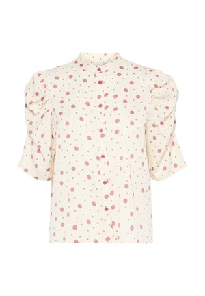 Blouse à manches courtes en crème avec des pois roses, dotée d'un col haut, d'une fermeture à boutons et de manches bouffantes. Texture lisse et tissu léger.
