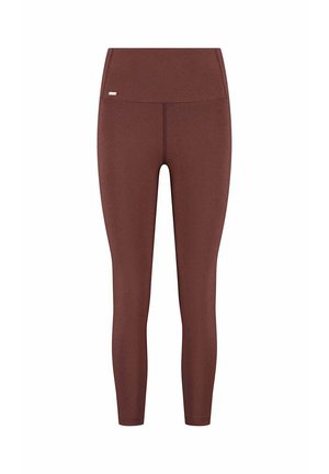Bruine leggings met hoge taille gemaakt van rekbare stof, met een gladde textuur en een subtiel logo-accent vlak bij de tailleband.