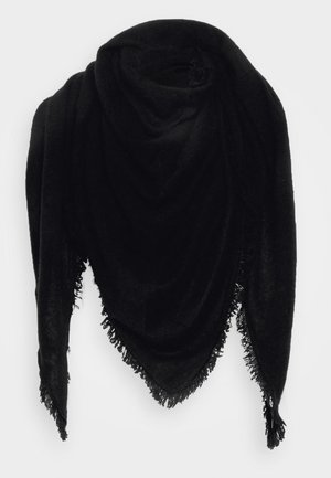 Écharpe triangulaire noire avec bords frangés, présentée avec de doux plis sur un fond blanc.