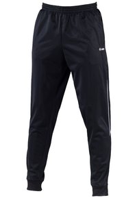 Černé sportovní kalhoty vyrobené z hladkého, lehkého materiálu, s tapered střihem a elastickým pasem, se bílými bočními pruhy.